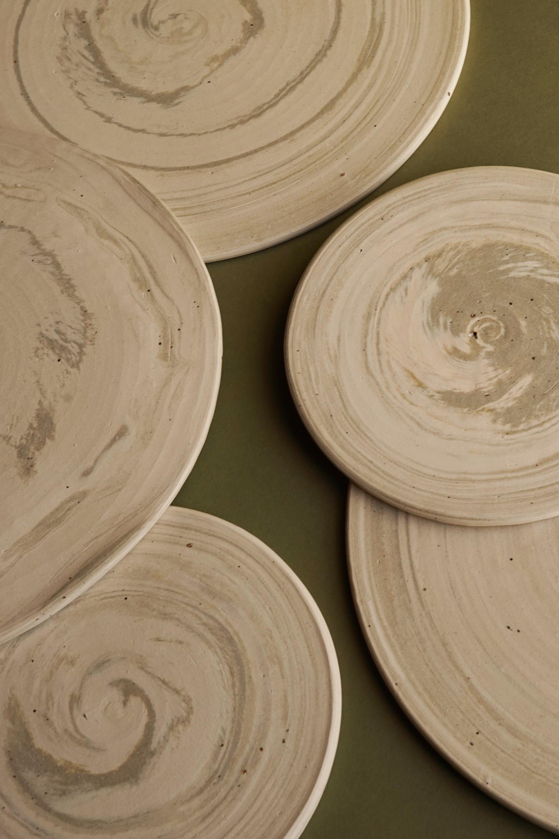 Harris ALT= Hand thrown ceramic platters by Emporium Julium using sand from the beaches of Harris.