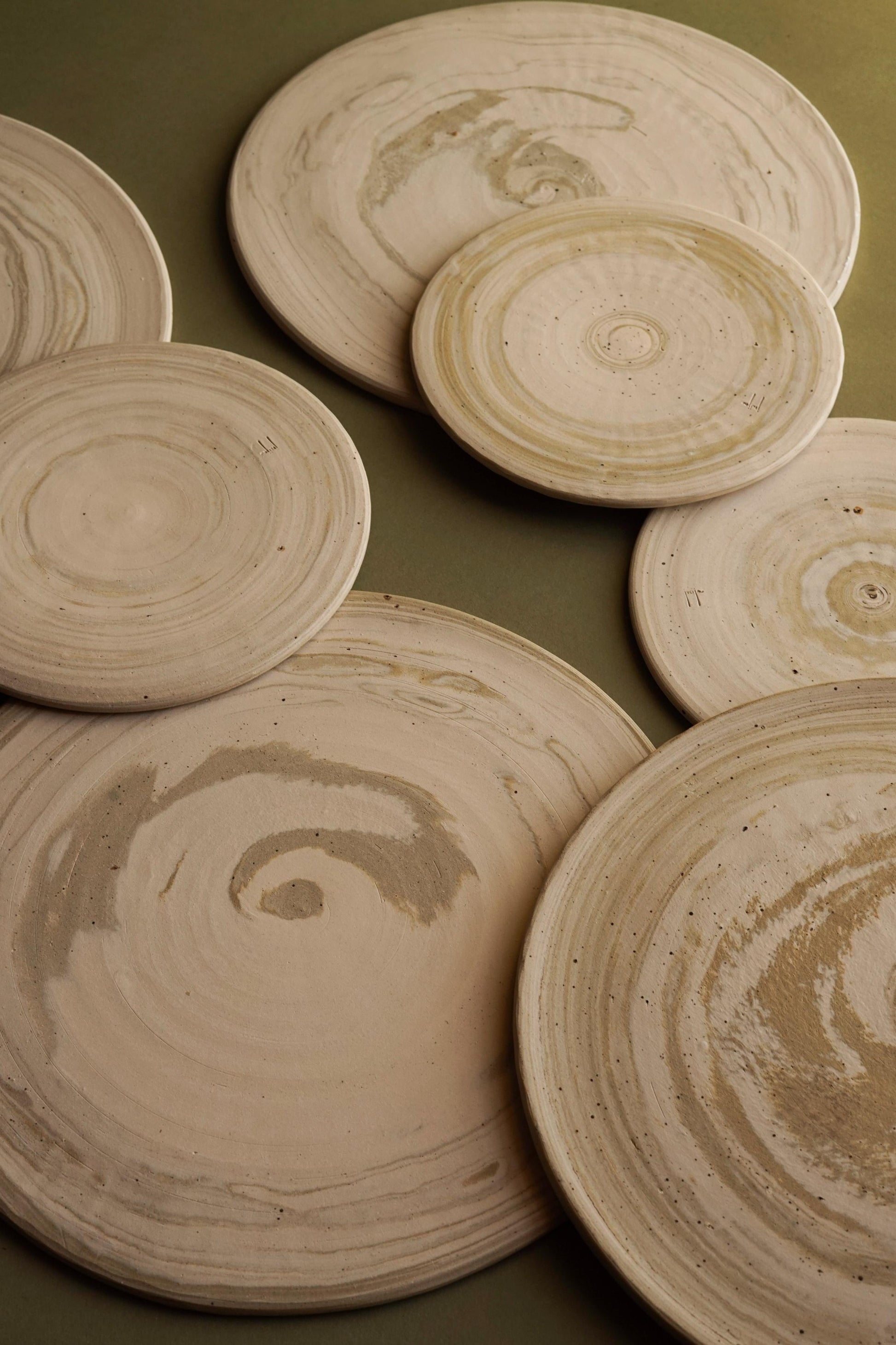 Orkney ALT= Hand thrown ceramic platters by Emporium Julium using sand from the beaches of Orkney.