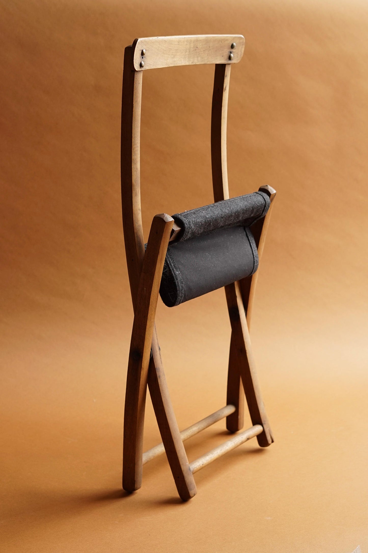 ALT= The antique wooden chair frame collapsed.