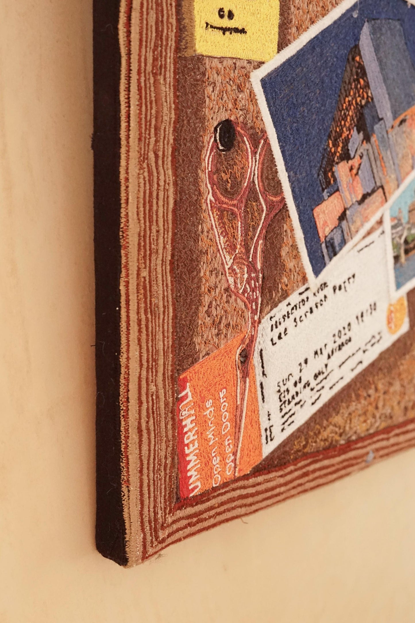 ALT= Corner of the Embroidered Pin Board by Laura Lees.