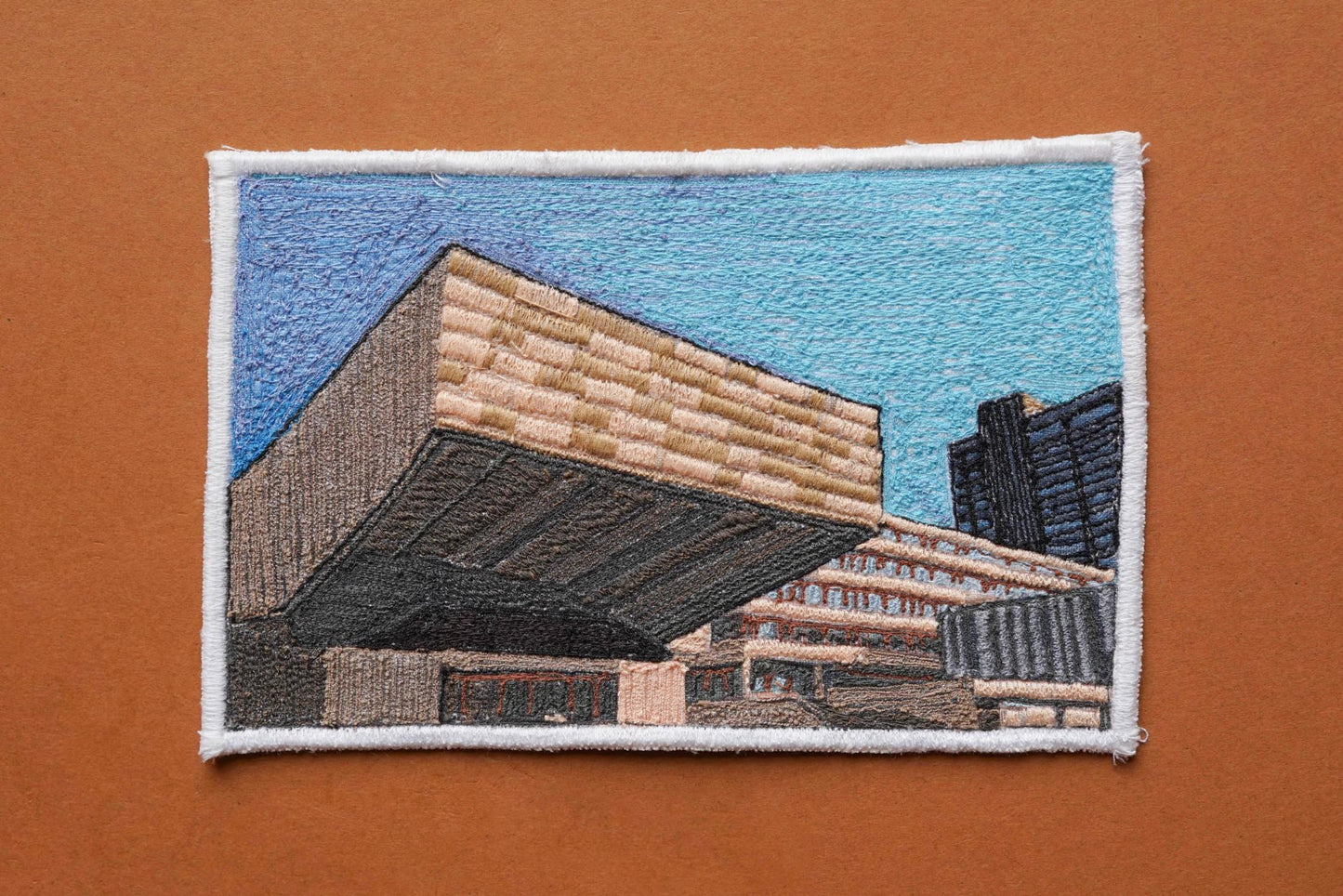 ALT= Embroidered Postcard by artist Laura Lees. This postcard is of the Edinburgh University Library.