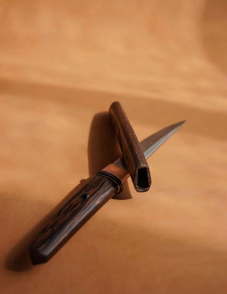 ALT=Jake Clelland's knives are all handmade in his workshop in Skye. Including this Japanese style knife, the Kwaiken.