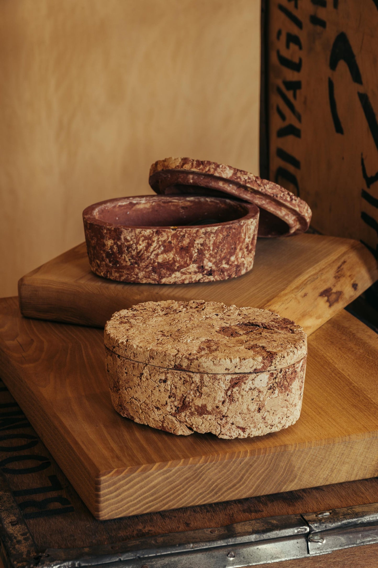 ALT= Two Wild Clay Boxes by cermacists Viv Lee and Jonathan Wade, in red and ochre hues. The colours from the local clays they collected by hand.