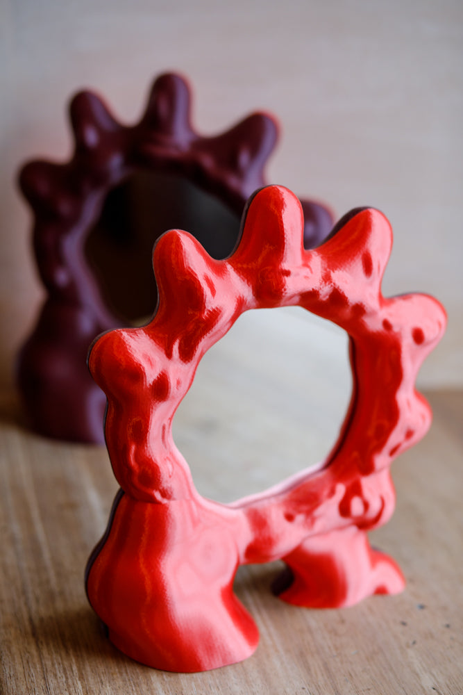 ALT=Shot showing the two sides of these Wobbly Digital mirrors. Sun shown here, also available in Moon, a yellow and gold colourway.