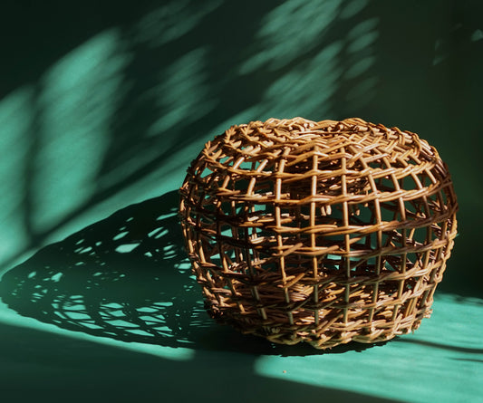 ALT=Lobster pot woven with willow from Catherine Davies and Pascal Carr's organic crop on the Hebridean Isle of Eigg.