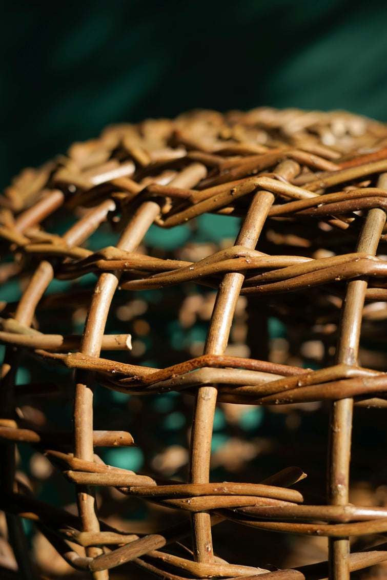 ALT=Willow lobster pot from the Hebridean Isle of Eigg.
