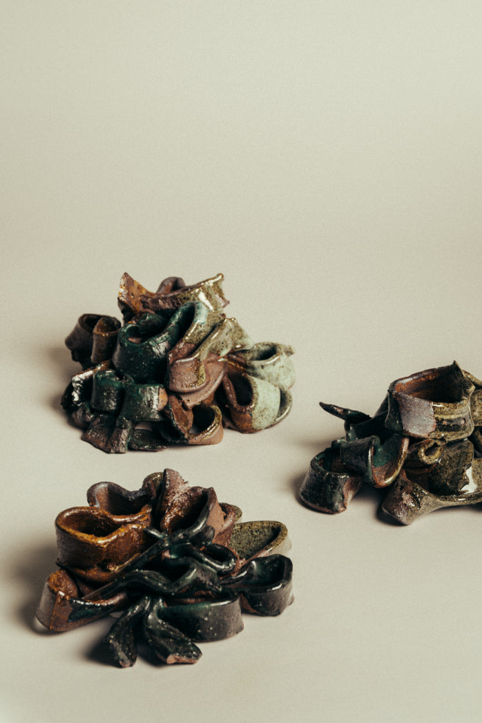 Morven Mulgrew Mortar Gun Ribbons Candlesticks