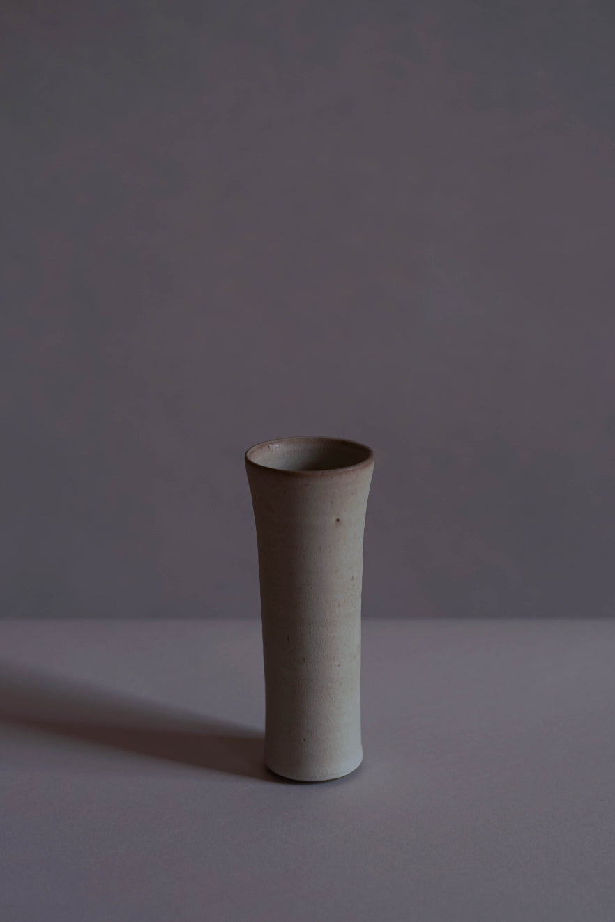 ALT=A small white vase crafted by Jono Smart & Emily Stephen.