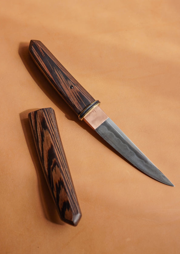ALT=Kwaiken knife forged and handmade by Jake Clelland. With a carbon steel blade and handle made from a single piece of wenge hardwood. 