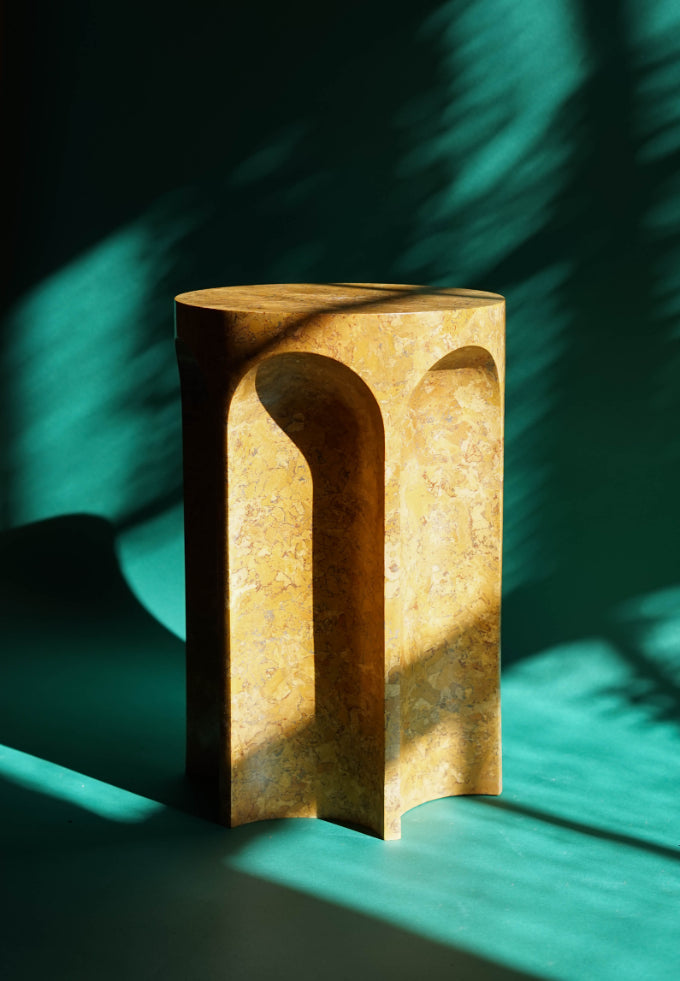 ALT=Six-fluted column side table by master plasterers Ffion and Steven Blench, who go by the studio name Chalk Plaster. 