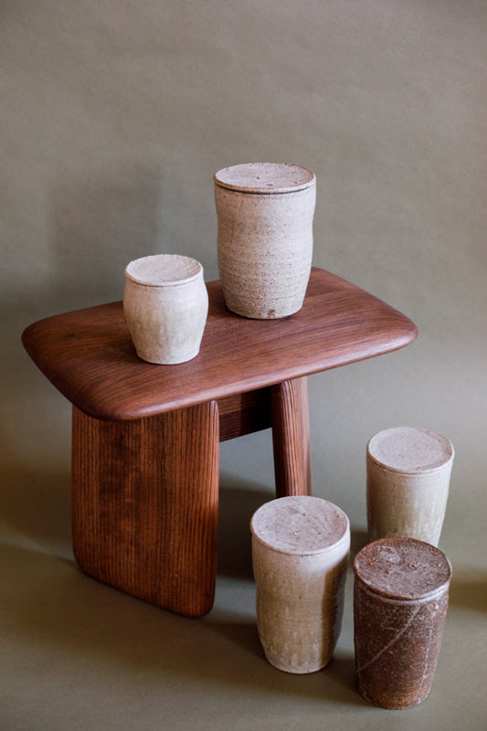 ALT=A collection of jars by Ingot Objects. Ash glazed in sizes small and medium.